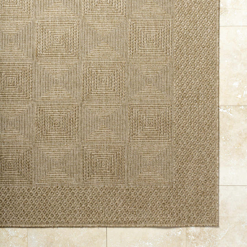 Close-up of the Anabia Brown Area Rug showing its woven texture and geometric square pattern in prairie dust and tan. Swatch