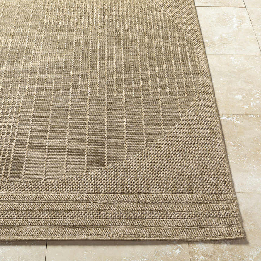 Close-up of the Yuley Brown Area Rug showing its prairie dust and tan colors, woven texture, and geometric stripe pattern. Front