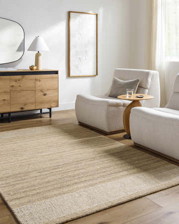 Living room scene with beige Alyssa Area Rug, light beige chairs, and wood accents. Roomscene-Rectangle