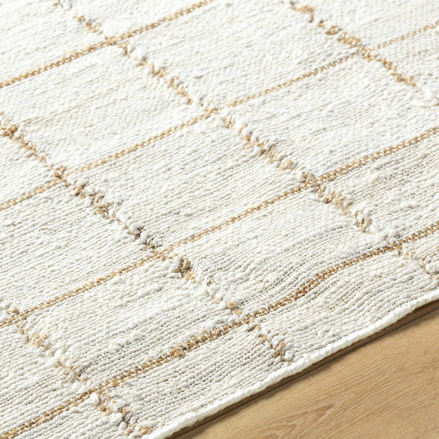Close-up of the hand woven Zared Checkered Jute Area Rug, ash and light silver color, farmhouse style. Texture