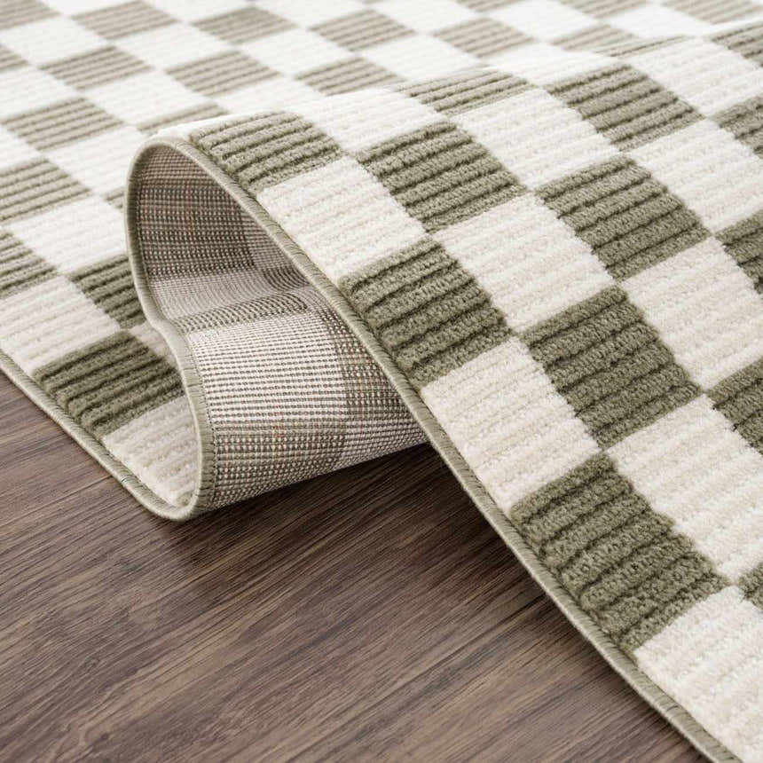 Close-up of the Kaysar Olive Green Checkered Washable Area Rug showing its texture, checkered pattern, and colors. Fold