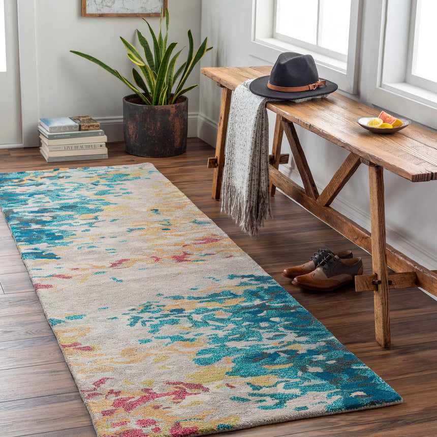 Hallway scene with Bualan Stone Pattern Wool Blend Rug, wooden bench, hat, and shoes. Aqua, yellow, and red accents. Roomscene-Runner