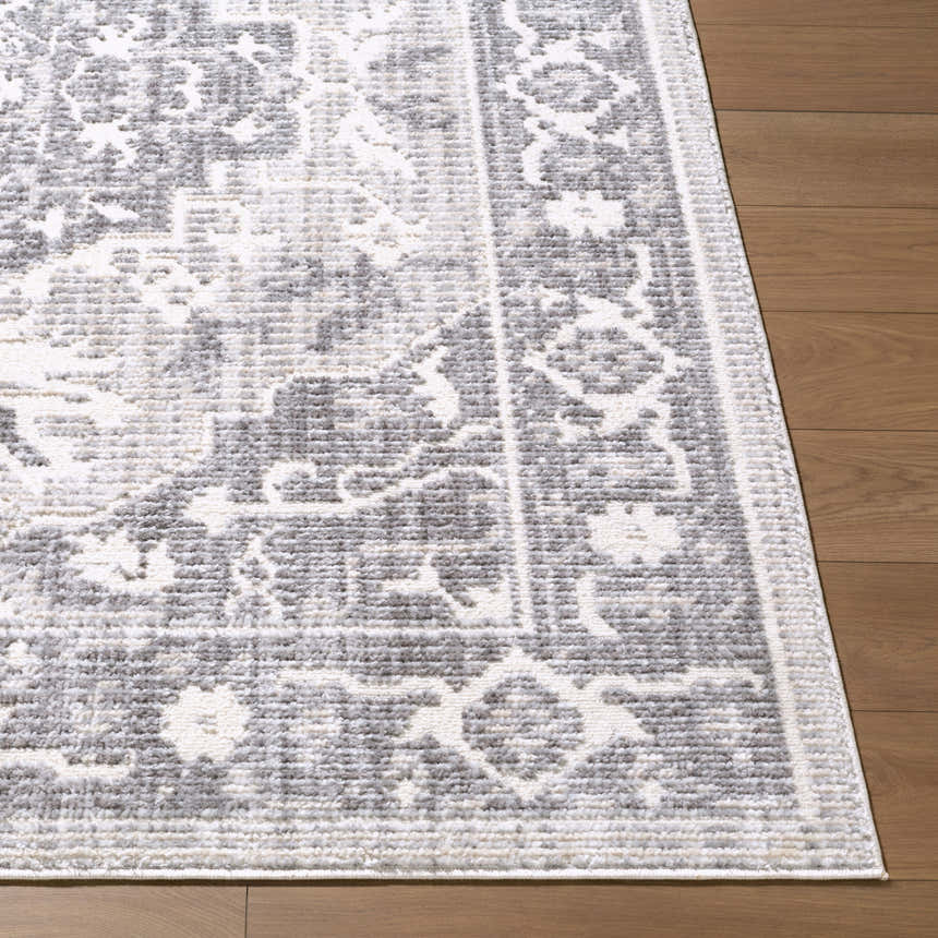 Close-up of the Odeon Elle Decor x LIVABLISS EDOD-2305 Area Rug showing its charcoal, cream, and gray contemporary pattern. Front