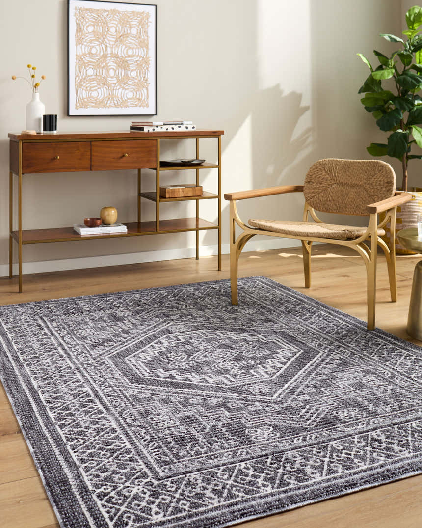 Living room scene with Odeon Elle Decor x LIVABLISS EDOD-2306 area rug in black, charcoal, cream, and ivory. Contemporary style. Roomscene-Rectangle
