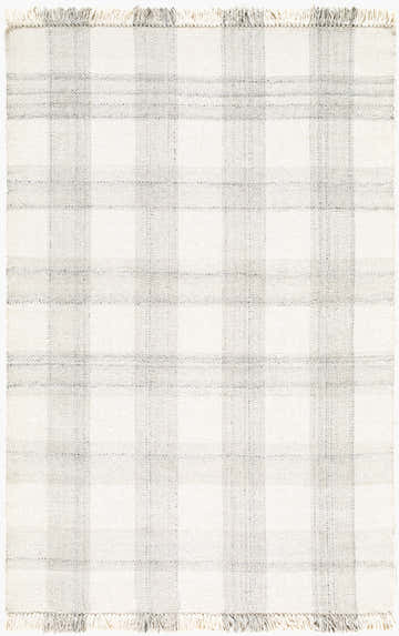 Close-up of the hand woven Elidia Area Rug. Charcoal, dove gray, and ivory plaid pattern with fringe. 100% Wool. Design-Rectangle-576