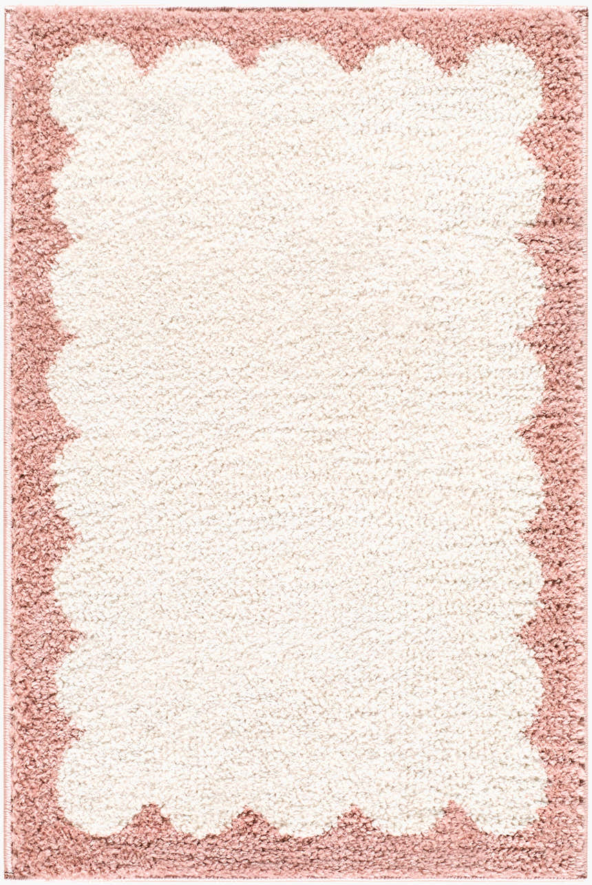 Close-up of Vopee Ivory Border rug. Machine woven polyester rug with ivory center and pink scalloped border. Design-Rectangle-2211
