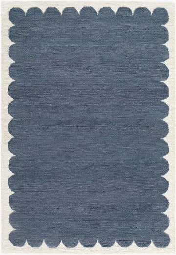 Close-up of the Lukamu Modern Art Deco rug. Blue wool rug with a scalloped ivory border. Hand-tufted rectangular rug. Design-Rectangle
