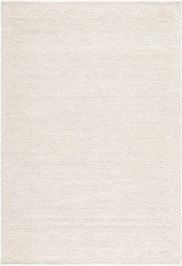 Close-up of a hand-tufted Kazuto Area Rug. The rug is cream and ivory wool with a subtle geometric pattern. Design-Rectangle
