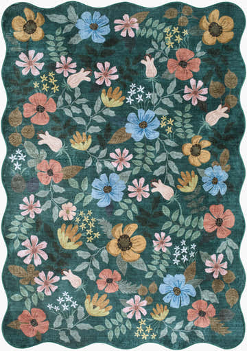Close-up of the Fergie Washable Area Rug. Teal background with a floral pattern in blush pink, coral, mustard, and sky blue. Design-Rectangle-576