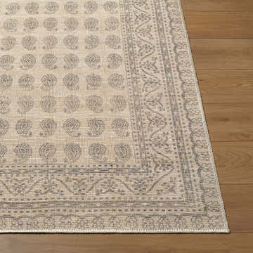 Close-up of Alo Machine Woven Nabela Noor rug; jute and polyester texture with gray floral and geometric pattern on wood floor. Front