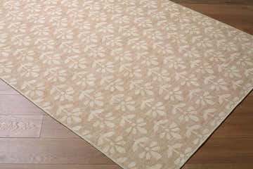 Close-up of the Xataa Light Brown Floralnature Jute Rug showing its floral pattern and woven texture. Corner