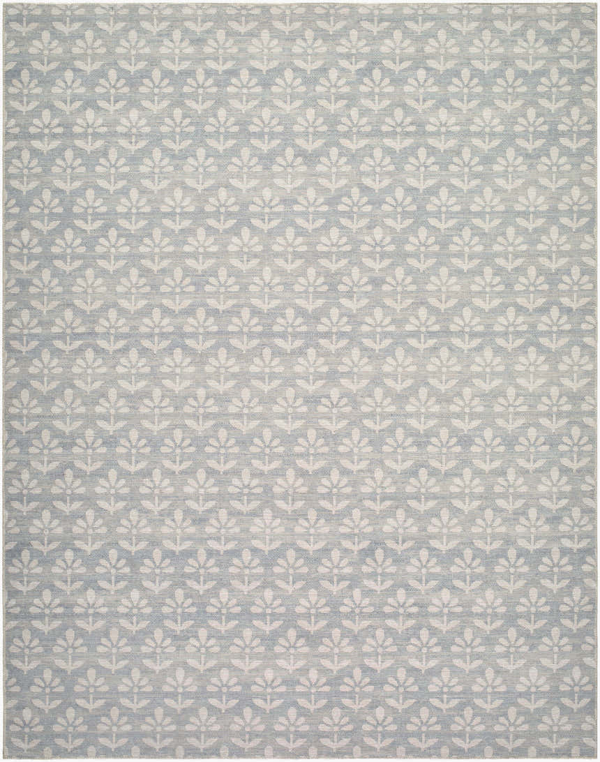 Close-up of the Maya Machine Woven Nabela Noor Home x LIVABLISS NBMY-2301 Area Rug. Sky blue rug with off-white floral pattern. Design-Rectangle-71010