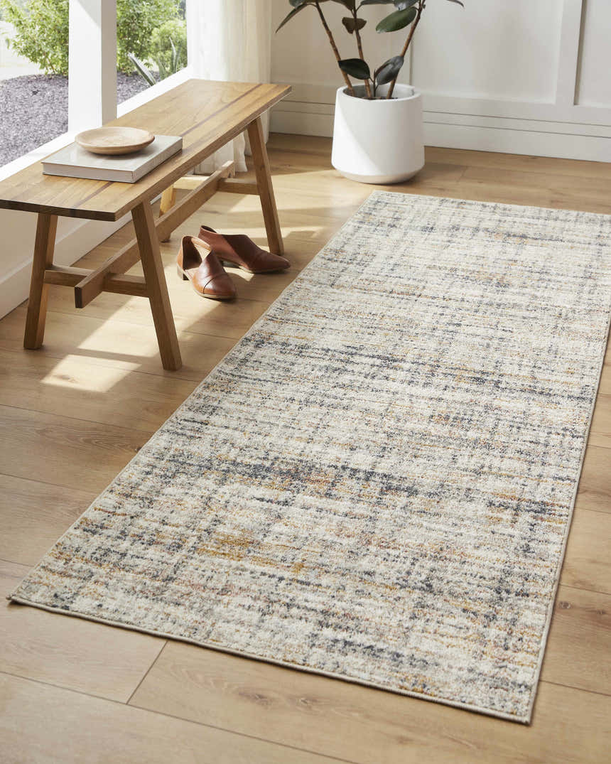 Entryway scene with a lambswool Jules Area Rug, wood bench, and light wood floors. Contemporary style. Roomscene-Rectangle
