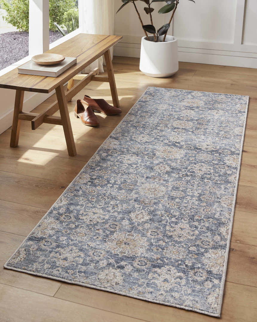 Entryway with a light wood bench and the light gray Metin Area Rug runner on wood floors. Roomscene-Runner