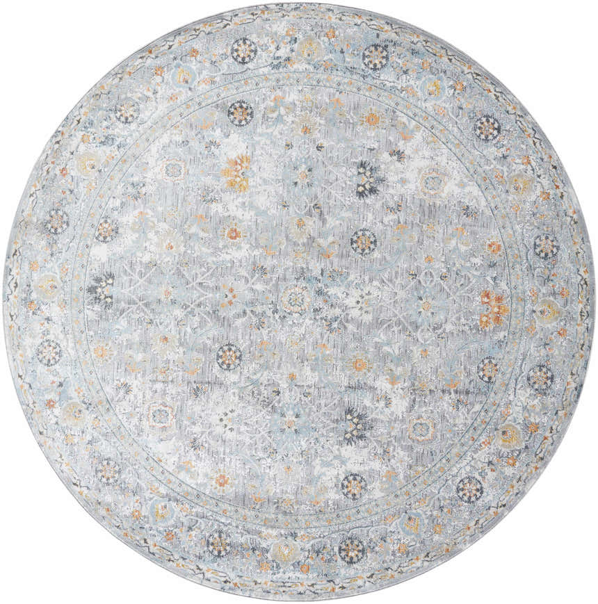 Close-up of a round Finn Silver Blue Area Rug. Features a traditional floral pattern in silver, gray, and blue tones. Design-Round-710