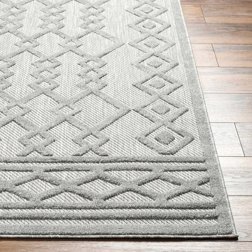 Close-up of Kort SFG-2310 area rug showing bone, natural gray, and taupe geometric pattern and textured weave. Front