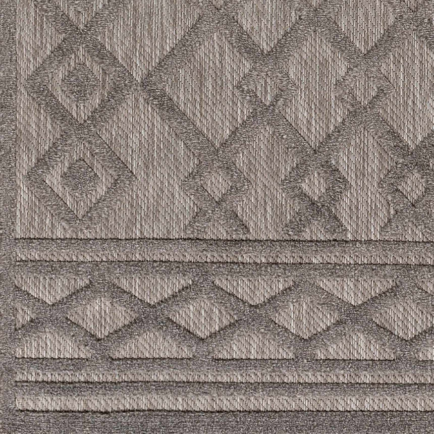 Close-up of the Kort SFG-2310 Area Rug. Machine woven polypropylene rug in bone, natural gray, and taupe with geometric pattern. Swatch
