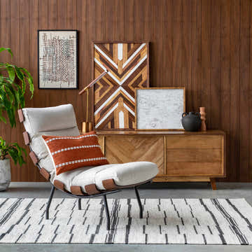 Mid-century modern living room with a cream chair and the Willington Area Rug in charcoal and cream. Roomscene-Rectangle