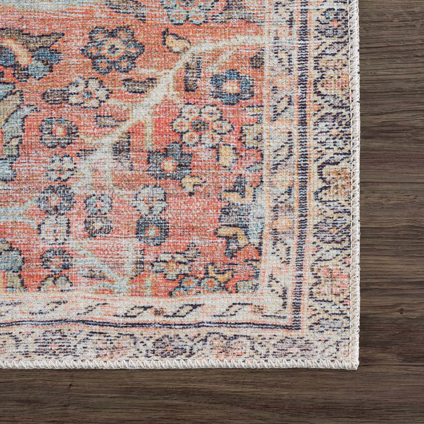 Close-up of the Urpi Rose & Blue Washable Area Rug showing its traditional Persian-style pattern and colors. Swatch