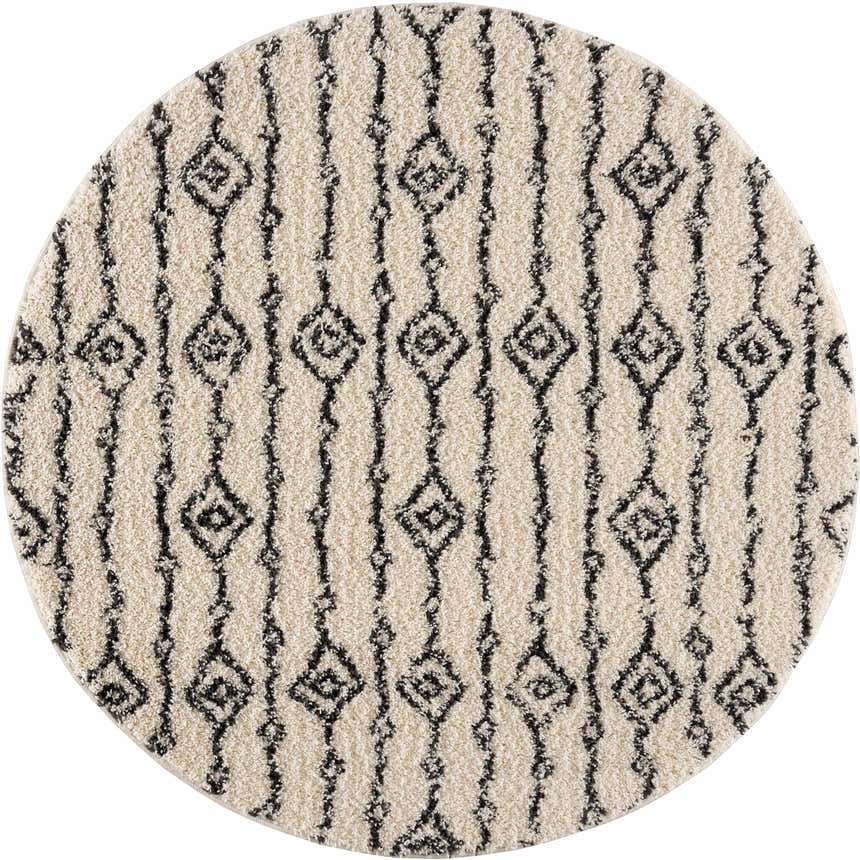 Round Bayanga area rug with a shag texture and a charcoal diamond pattern on a light gray background. Design-Round
