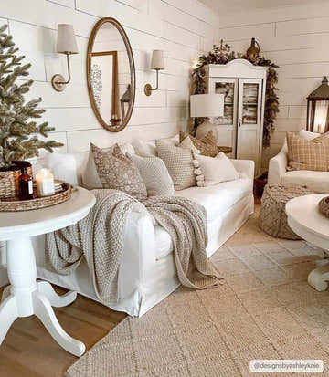 Farmhouse living room with white sofa and Syosset area rug in neutral tones, creating a cozy, inviting space. Roomscene-Rectangle