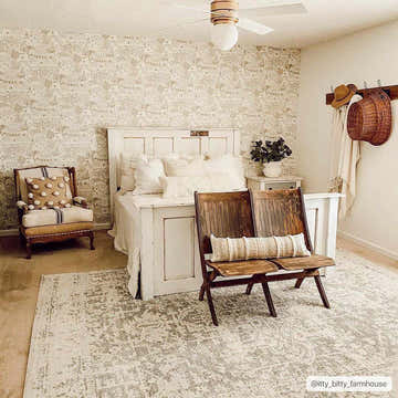 Farmhouse bedroom with Rachel Area Rug, white bedding, and vintage wooden chairs. Neutral color palette. Roomscene-Rectangle