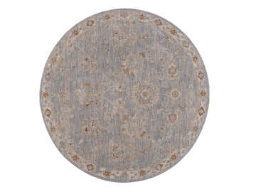 Close-up of a round Mangham Thick Luxe Area Rug. Features an oriental pattern in light gray, beige, and rust tones. Design-Round-67