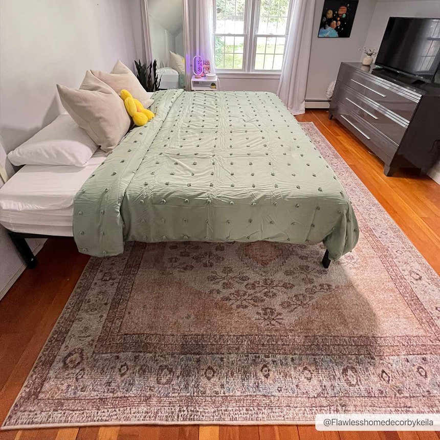 Bedroom scene with Analu Non-Slip Washable Rug in brown/red. Farmhouse style with bed, dresser, and wood floors. Roomscene-Rectangle