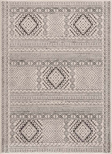 Close-up of Merriott Area Rug. Charcoal, dark brown, and light beige bohemian pattern with diamond and geometric designs. Design-Rectangle-5373