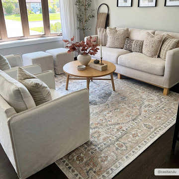 Living room scene with beige sofas and Hiti Beige Flat Pile Washable Rug in a vintage oriental style. Roomscene-Rectangle