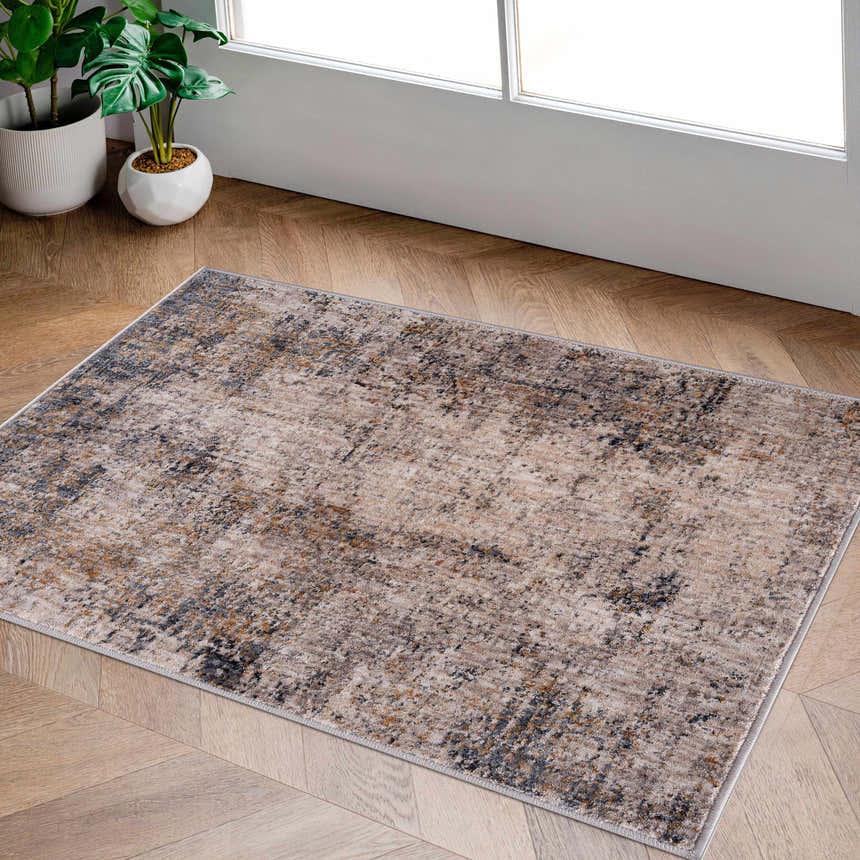 Entryway with Odell Abstract Luxe Fringe Rug in dark blue, light blue, gray, and mustard on wood floor. Roomscene-Rectangle