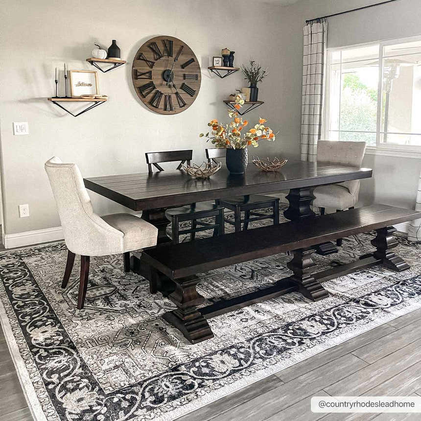 Dining room with dark wood table and Cabacungan Washable Area Rug in black, gray, and beige. Bohemian farmhouse style. Roomscene-Rectangle