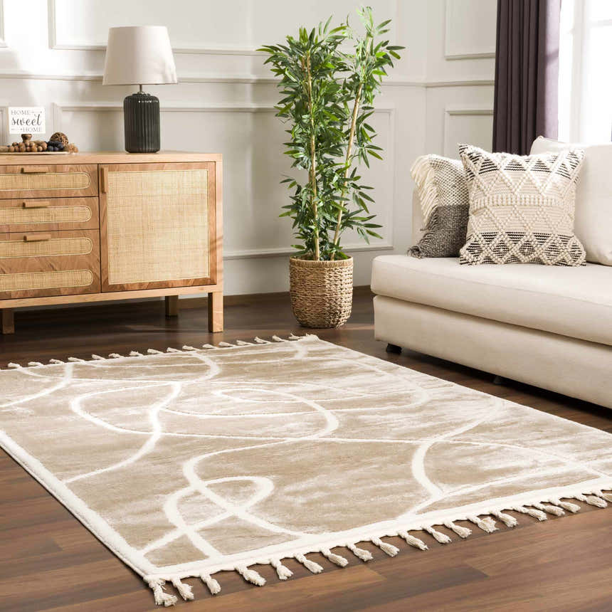 Living room scene with a cream sofa and the Azana Cream Area Rug featuring an abstract geometric design. Roomscene-Rectangle