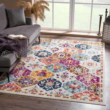 Living room scene with the New Custar Area Rug, featuring burgundy, orange, navy, and teal floral medallions. Farmhouse style. Roomscene-Rectangle