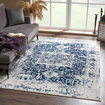 Living room scene with gray sofa and the navy and gray New Limestone Area Rug. Roomscene-Rectangle