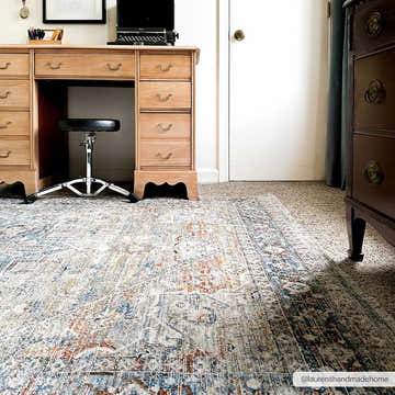 Home office with wood desk and Elita Area Rug in camel, clay, and blue tones. Farmhouse style rug. Roomscene-Rectangle