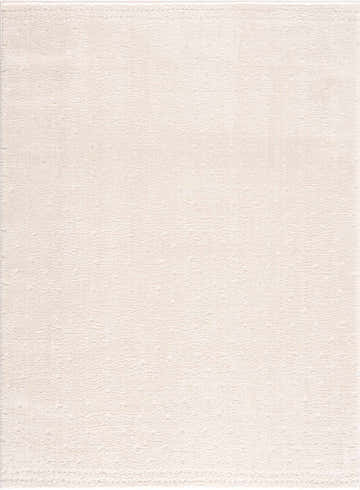 Close-up of the Julie Ivory Area Rug showing its subtle texture and soft beige color. Design-Rectangle-537