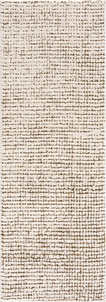 Close-up of the Keita Cream & Brown Area Rug, featuring a geometric pattern and soft, textured polyester material. Design-Runner-2773