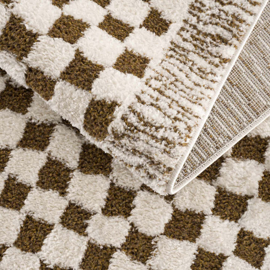 Close-up of the plush Leryn Brown Checkered Rug. Beige and brown checkered pattern, soft texture. Fold