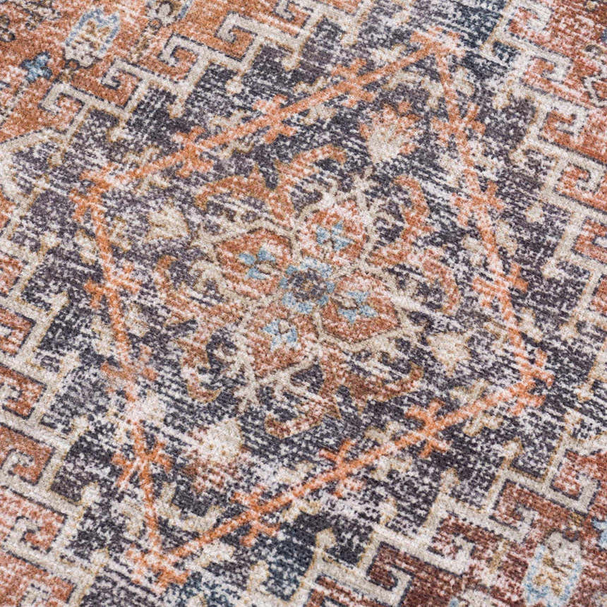 Close-up of Blue Burgundy Holi-2302 rug. Beige, burgundy, and orange hues create a vintage Persian pattern. Washable polyester texture. Texture