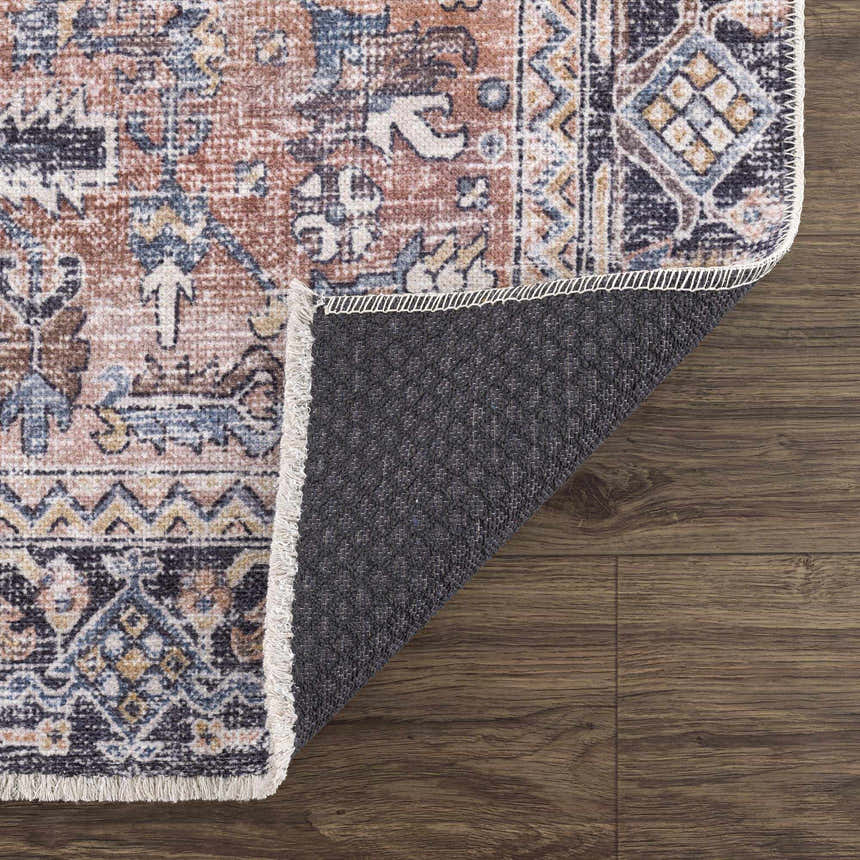 Close-up of the Holi-2305 Boutique Washable Rug showing its burgundy, cream, and blue traditional pattern and non-slip backing. Fold