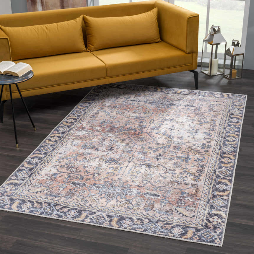 Living room scene with a yellow sofa and the Holi-2305 Boutique Washable Rug in burgundy, cream, and slate colors. Roomscene-Rectangle