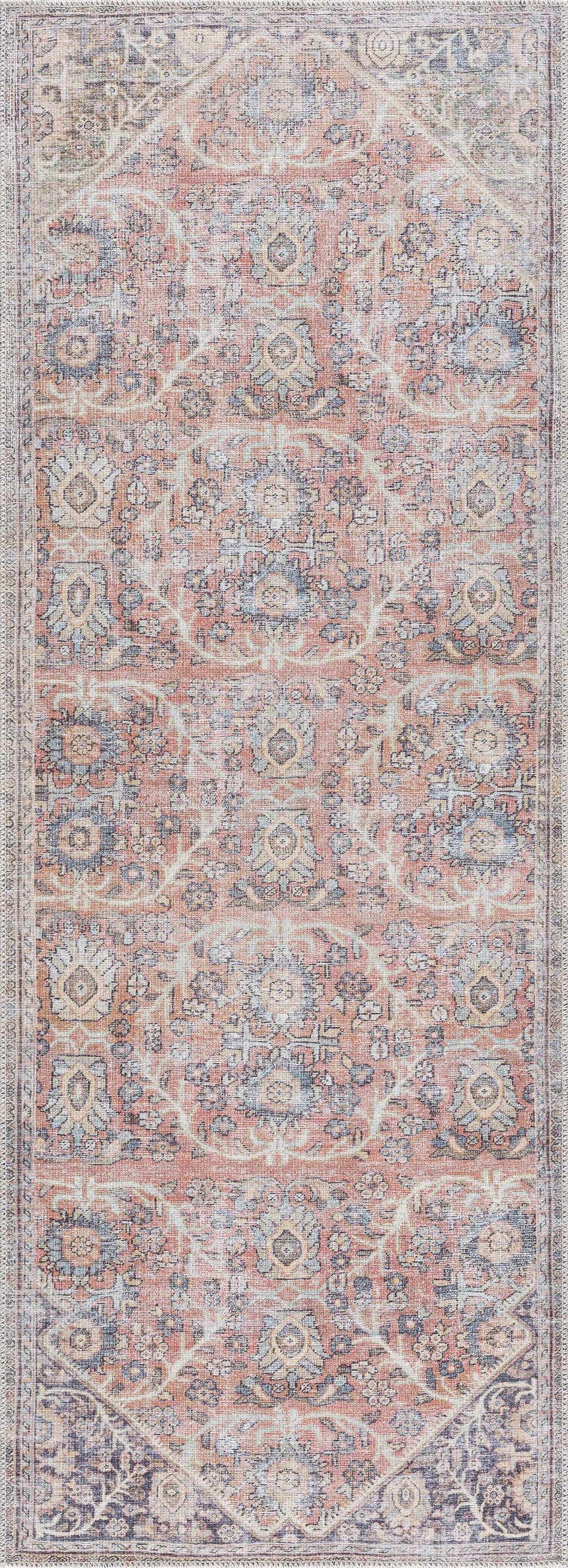 Close-up of the Konstantina Washable Area Rug. Features a vintage Persian design in peach, beige, and navy. Machine printed texture. Design-Runner-2773