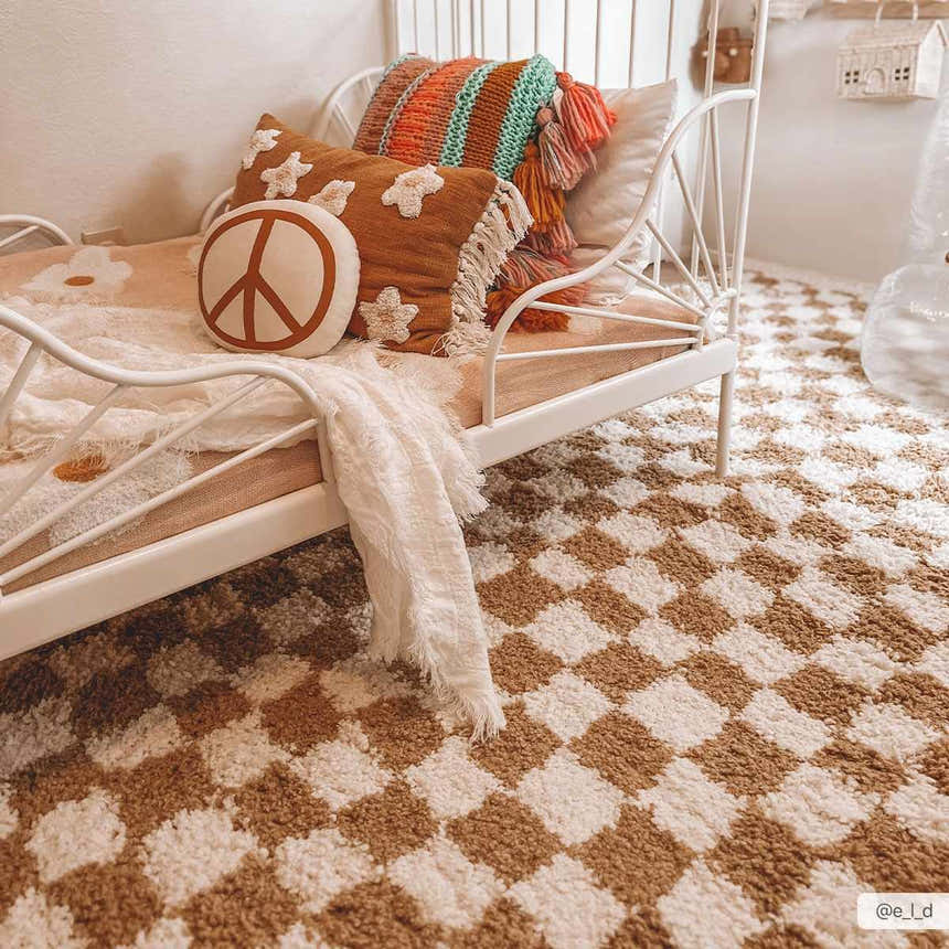 Kids room scene with a white metal bed frame and the Kieu Mustard & Ivory Checkered Area Rug. Roomscene-Rectangle