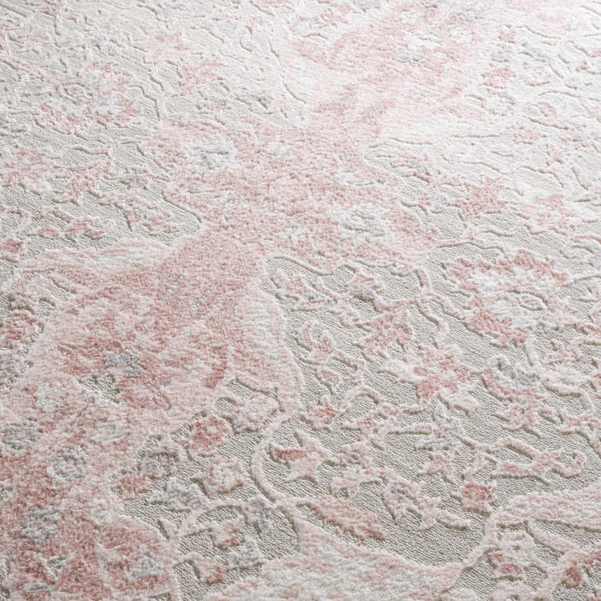 Close-up of the Zora Pink Area Rug showing a traditional vintage floral pattern in pink, gray, and ivory. Texture