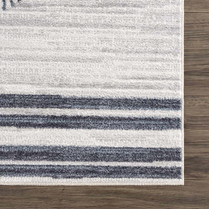 Close-up of the Thad Medium Gray Washable Area Rug showing its bone and dark gray horizontal striped pattern and soft texture. Swatch