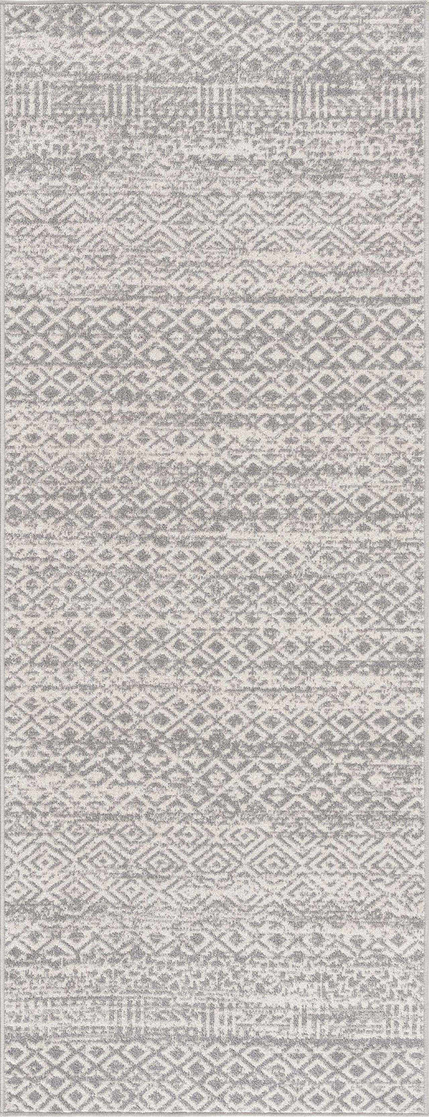 Close-up of Gravelbourg Washable Boho Rug. Gray and light gray geometric pattern. Machine woven texture. Design-Runner-2773