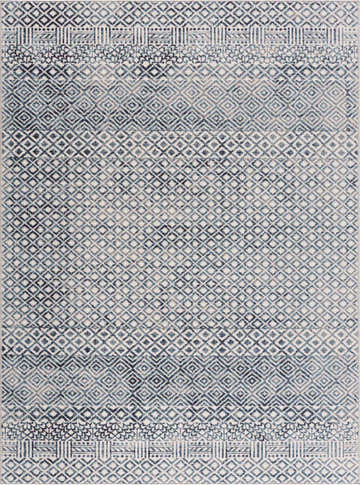 Close-up of the Askeaton Washable Area Rug, showcasing its diamond pattern in blue, gray, and light gray hues. Design-Rectangle-537