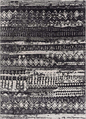 Close-up of the Palali Washable Area Rug. Black, gray, and light gray rug with a contemporary tribal-inspired pattern. Design-Rectangle-537