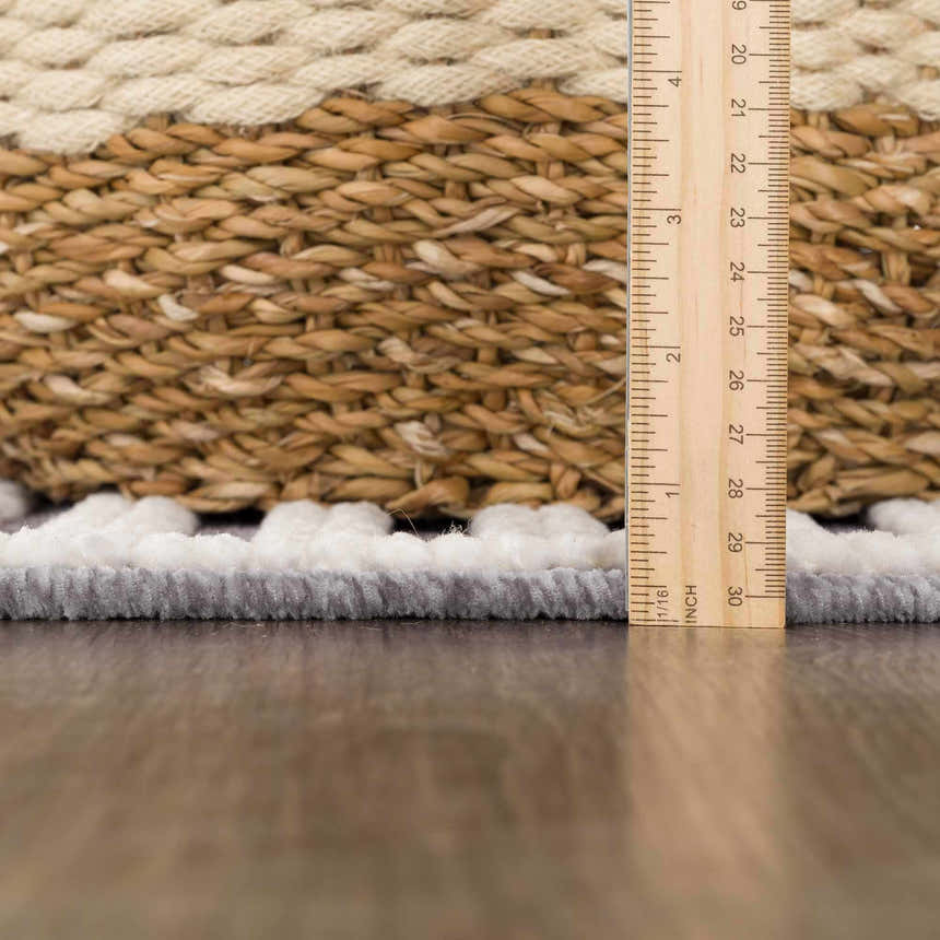 Close-up of the gray Deron Gray Rainbow Washable Rug showing texture and pile height with a ruler for scale. Pile